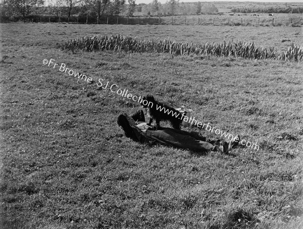 RECLINING FIGURE WITH DOG